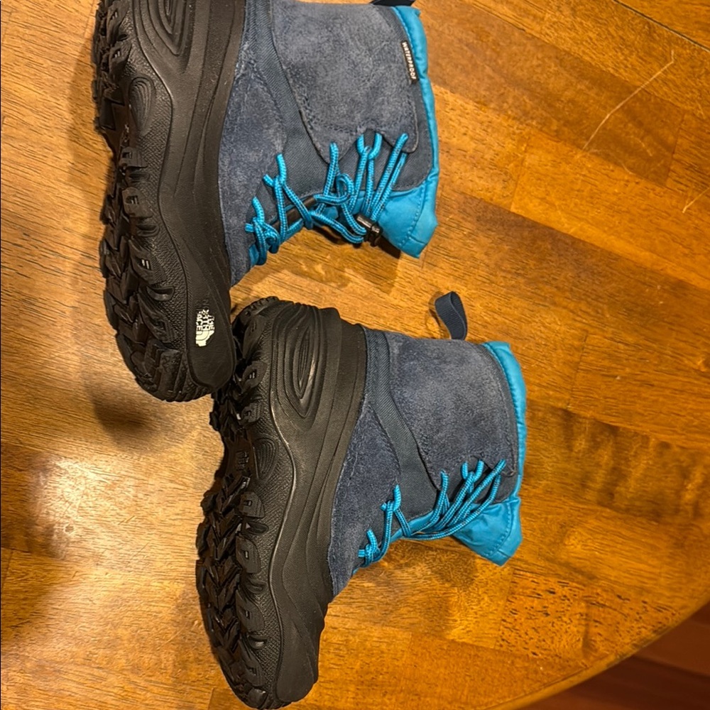 The North Face Blue and Black Winter Boots